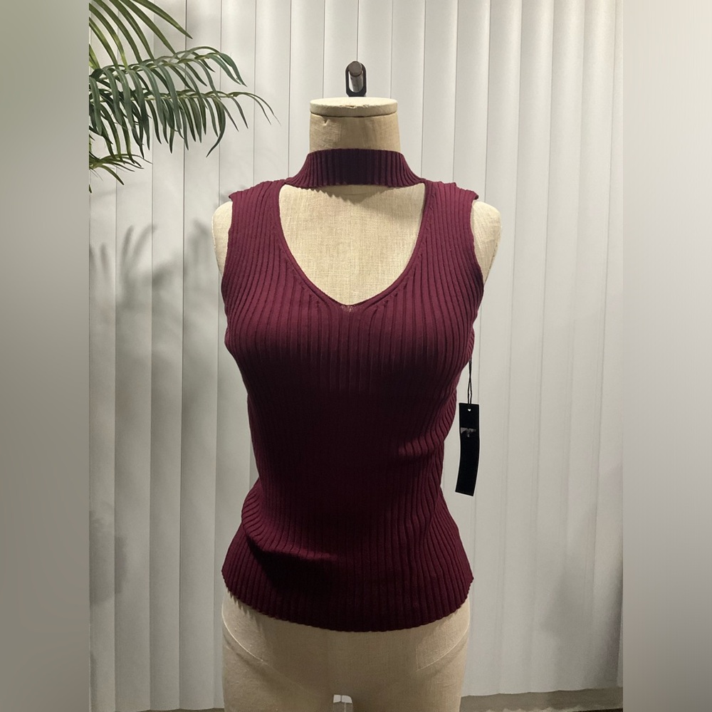 Woman’s turtleneck sleeveless shirts